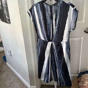 A Designer Dress colors of Dk blue, light blue, white.  Split open front .